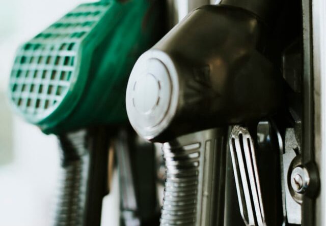 Closeup of fuel nozzles at a gas station